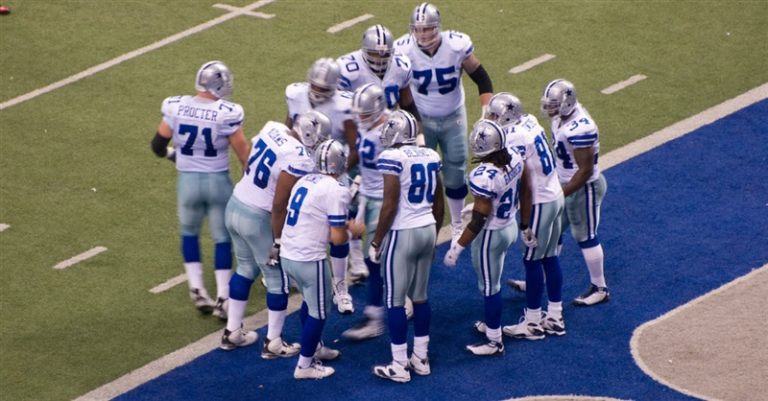 Three Dallas Cowboy Players Get Baptized in Viral Video