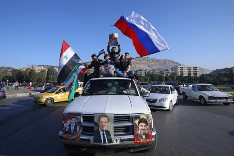 Syrians Gather in Damascus in Defiance After Airstrikes