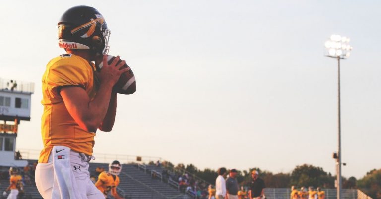 High School Football Players Pray before Game after Pastor is Barred from Praying with Them