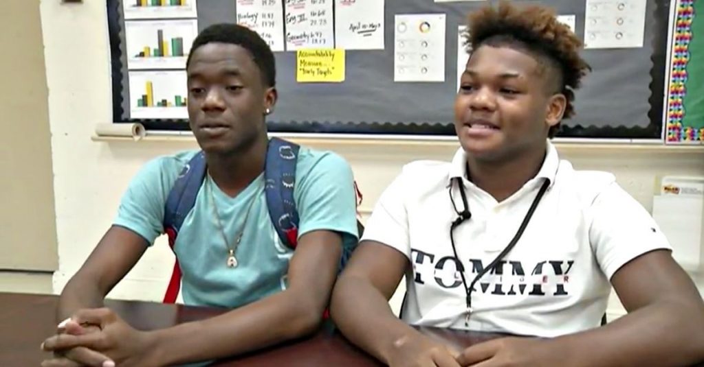 Two High School Football Players Give Their Clothes To Classmate