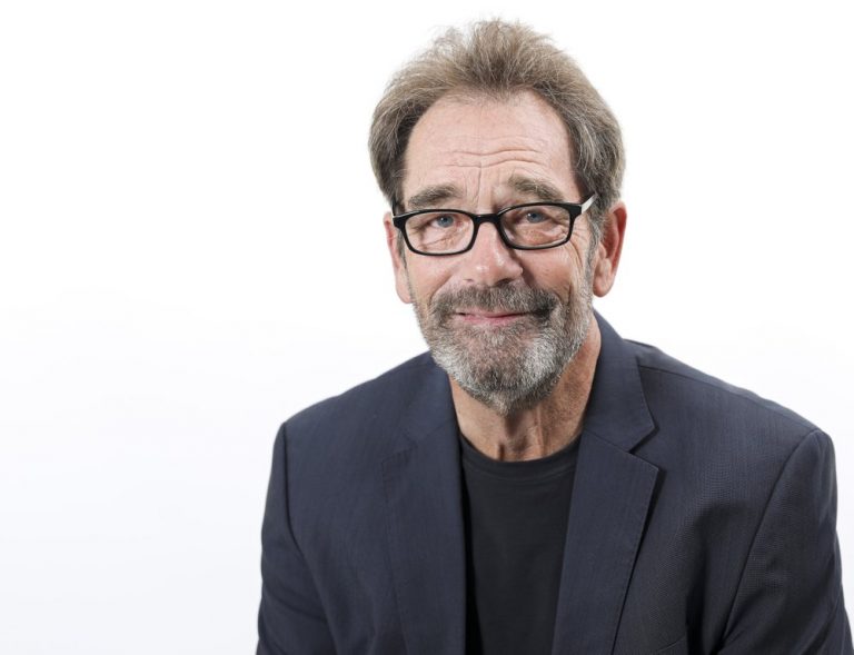 Huey Lewis pushes past hearing pain to keep making music