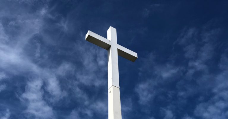 Students at Christian College Stand against Radical Protestors Who Want to Tear Down Cross