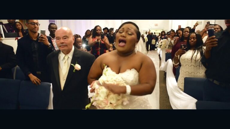 Bride Sings To Groom While Walking Down The Isle